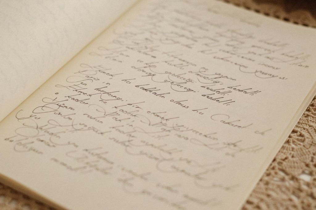 Poetry. Handwritten poem. Flourishing handwriting.