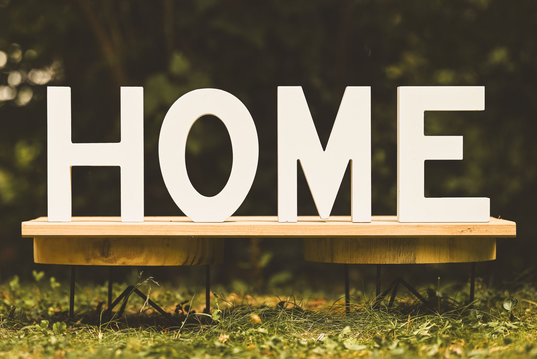 Sign that reads "HOME".