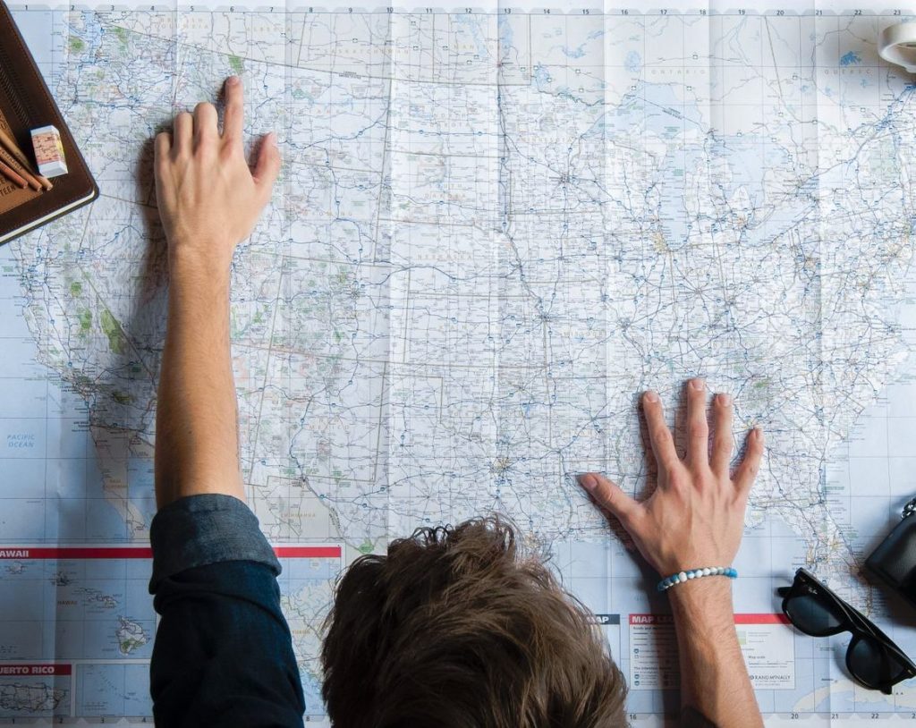 Man with United States map.