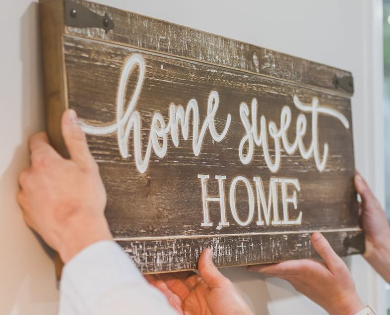 Sign that reads "Home Sweet Home".